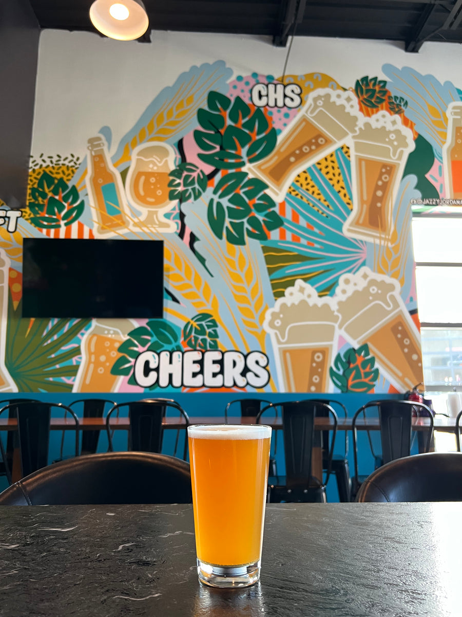 Colorful custom mural by Jazzy Jordan for Community Crafthouse in Mount Pleasant, SC